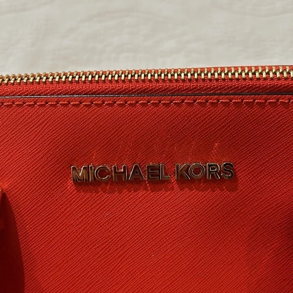 Michael Kors Orange hand bag/crossbody